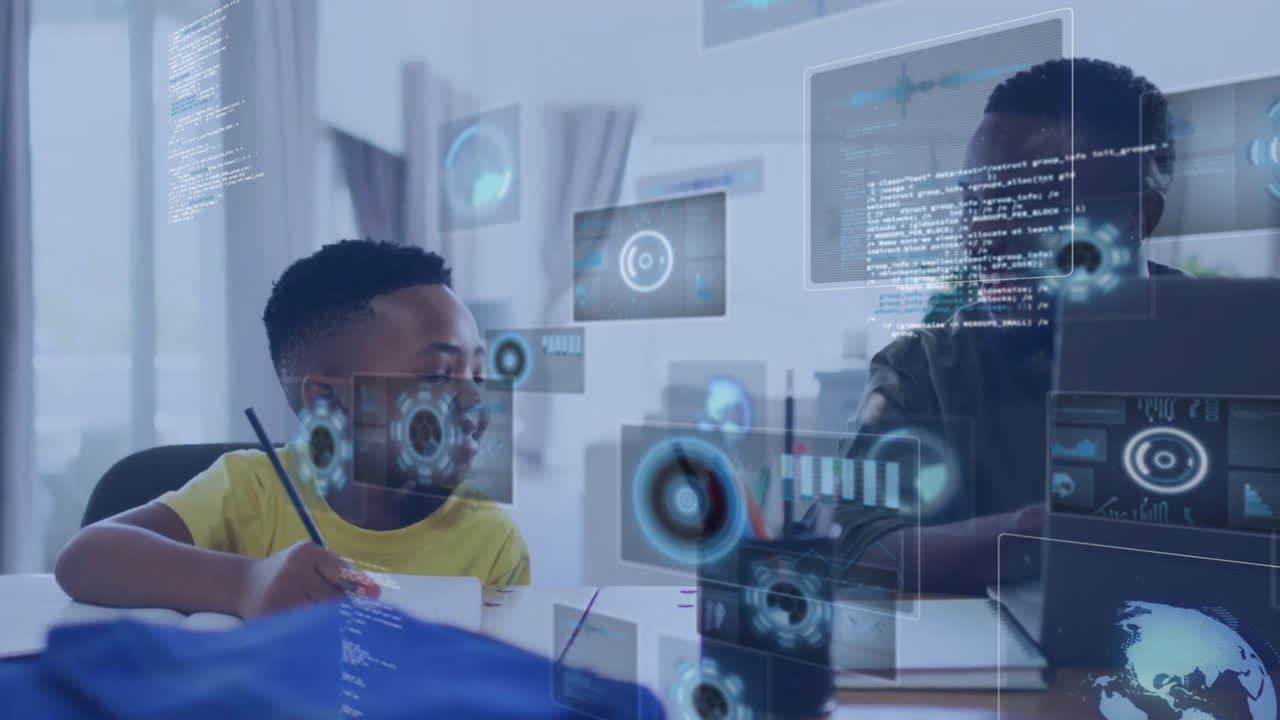 Animation of data over happy african american father and son using laptop and working at home