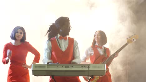 awesome afro guy playing the musical keyboard