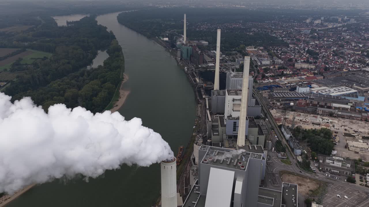Mannheim Power Plant, Coal fired power plant generates electricity for people,businesses, industry, district heating for around 120,000 households through combined heat and power. Aerial drone video