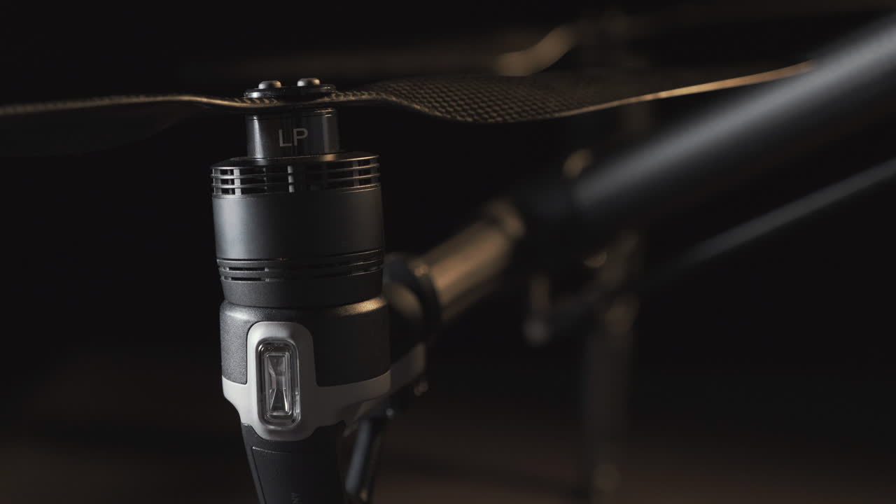 Track up the front right carbon fiber propeller attached to a DJI Inspire 2 professional drone
