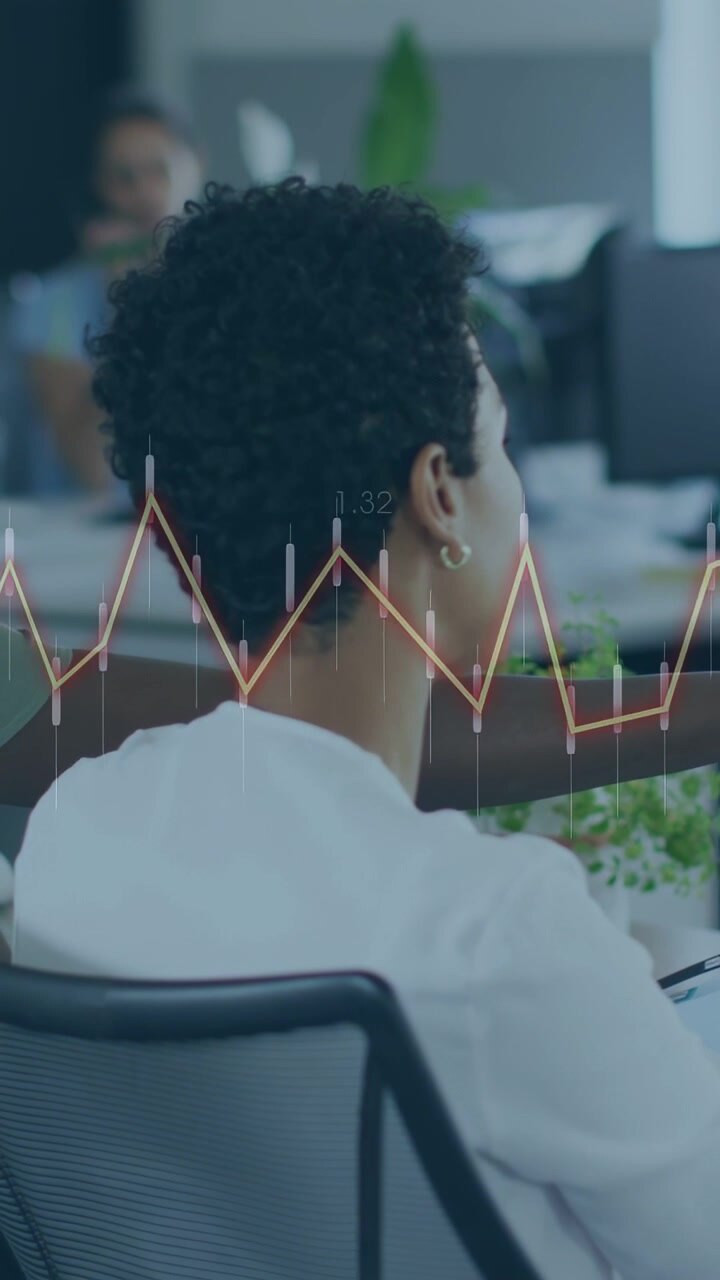 Vertical video: Woman reaching tablet as charts popping in for business review, peer pointing