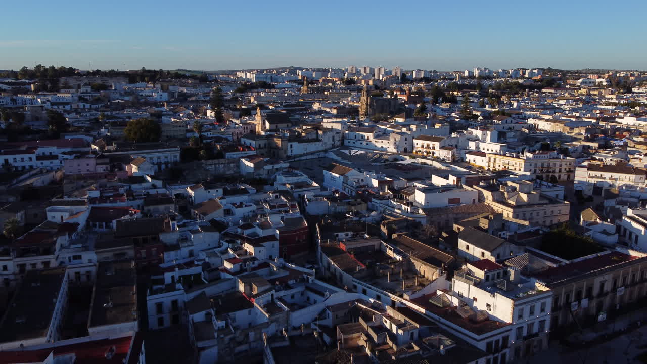 Panorama of Jerez de la Frontera passing over Cathedral during golden hour, Spain. Aerial