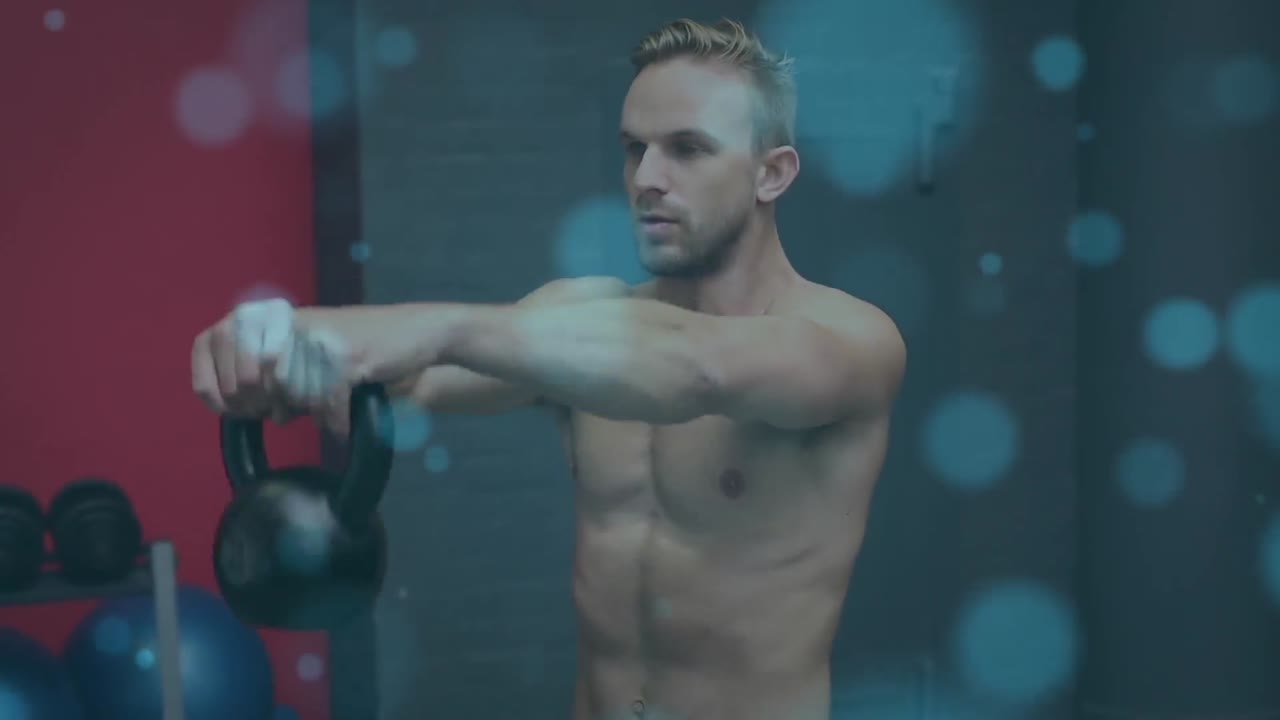 animación de luz brillante sobre un hombre en forma haciendo ejercicio en el gimnasio