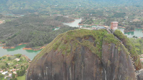 aerial view of piedra del peñol monolith stone in guatape, antioquia - drone shot