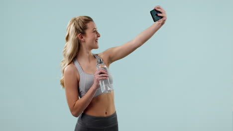 gym selfie, woman and water in studio