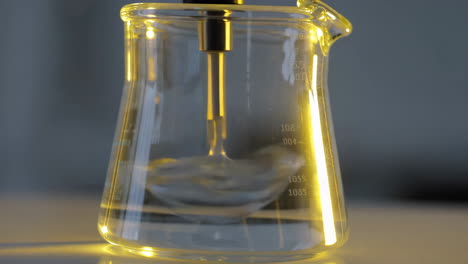 mixing liquid in a beaker
