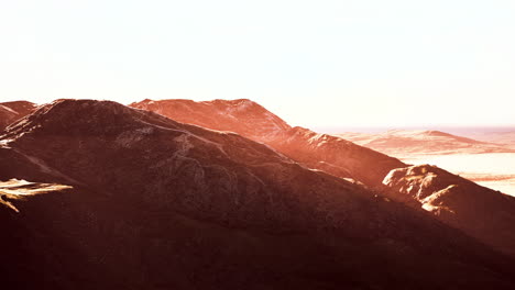 winter mountain landscape at sunset