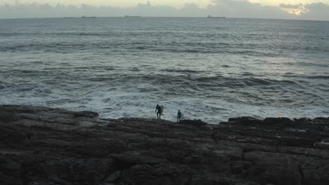 4k footage - surfers going in on dangerous place