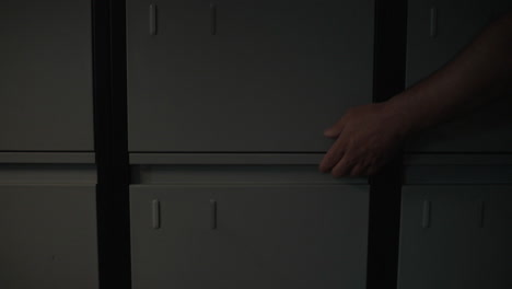 searching through files in a dark office