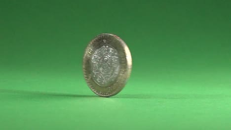 mexican coin spinning in a chroma background