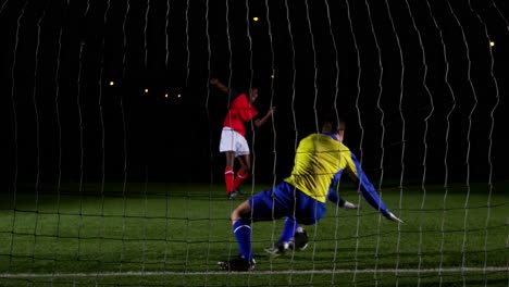 Goalkeeper-catching-a-soccer-ball-4k