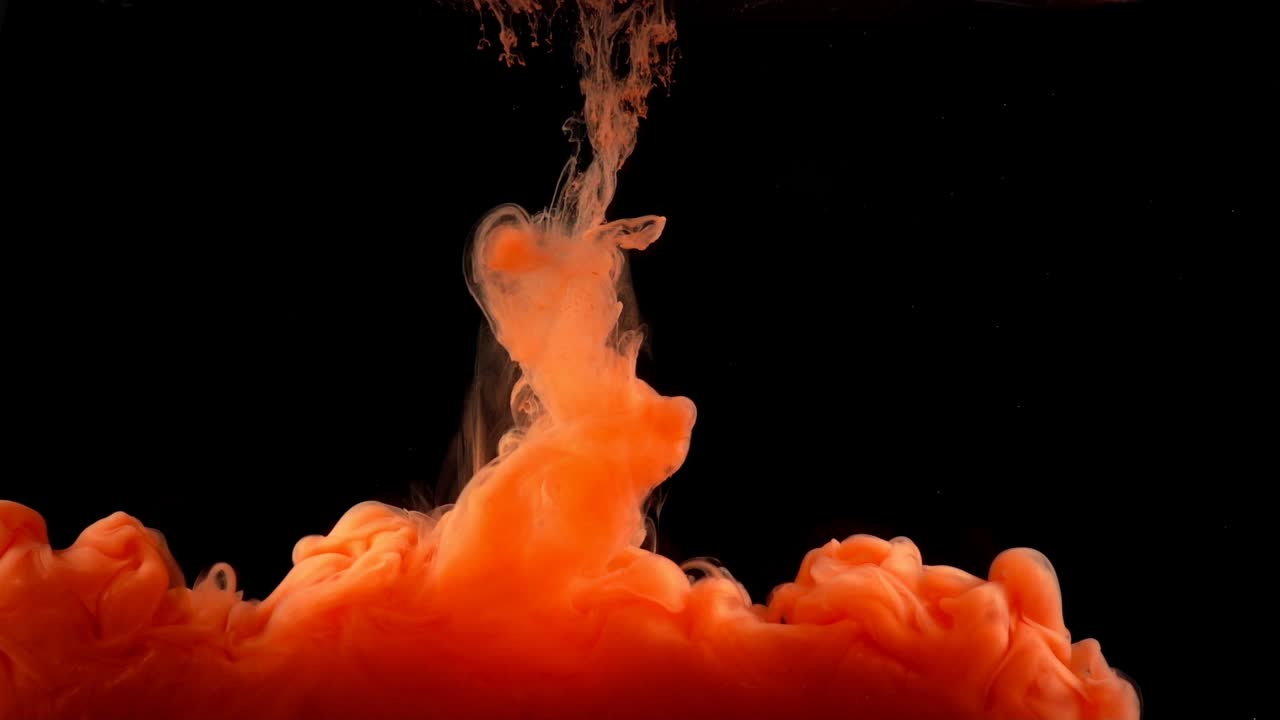 Paints. Abstract forms. Shooting on a black background