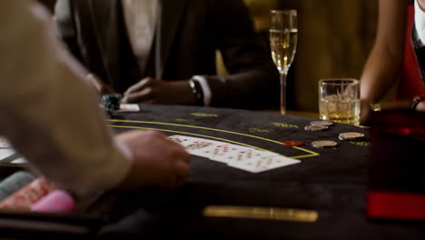 man playing poker at the casino.