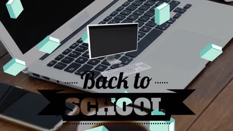 animación del texto de regreso a la escuela en un portátil
