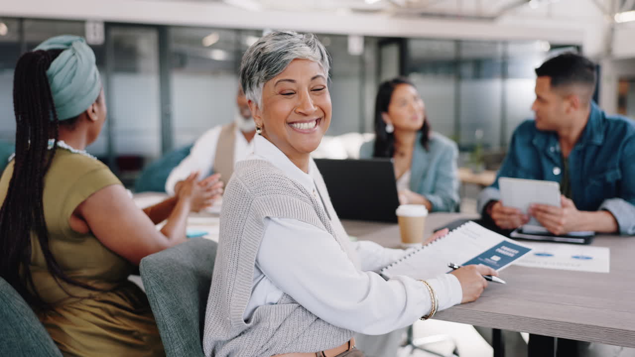 Senior woman, face and happy business meeting