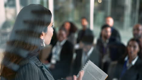 businesswoman giving a presentation to a group of colleagues