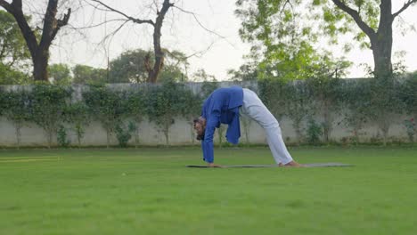 Indian-man-doing-Wheel-Yoga-pose