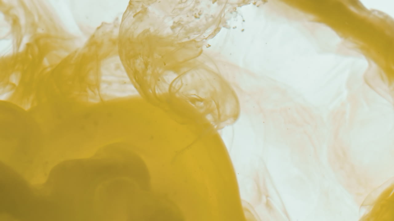 Abstract Yellow Ink in Water