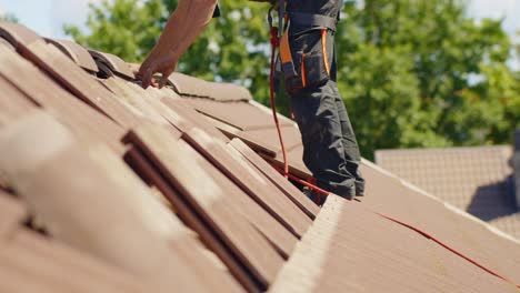 static shot of roof tile removal for solar panel installation at sunny day