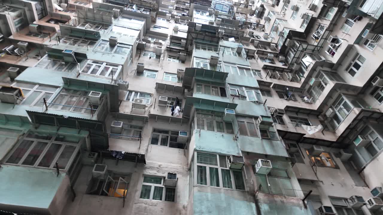 Dense Urban Architecture of Quarry Bay, Hong Kong. Panning shot