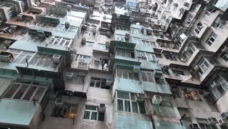 dense urban architecture of quarry bay, hong kong. panning shot