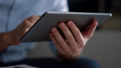 man hands using tablet computer pad. businessman surfing internet in office.