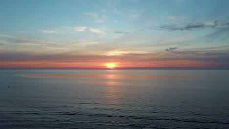 Dron-Flying-Over-Sea-in-a-Beautiful-Sunset