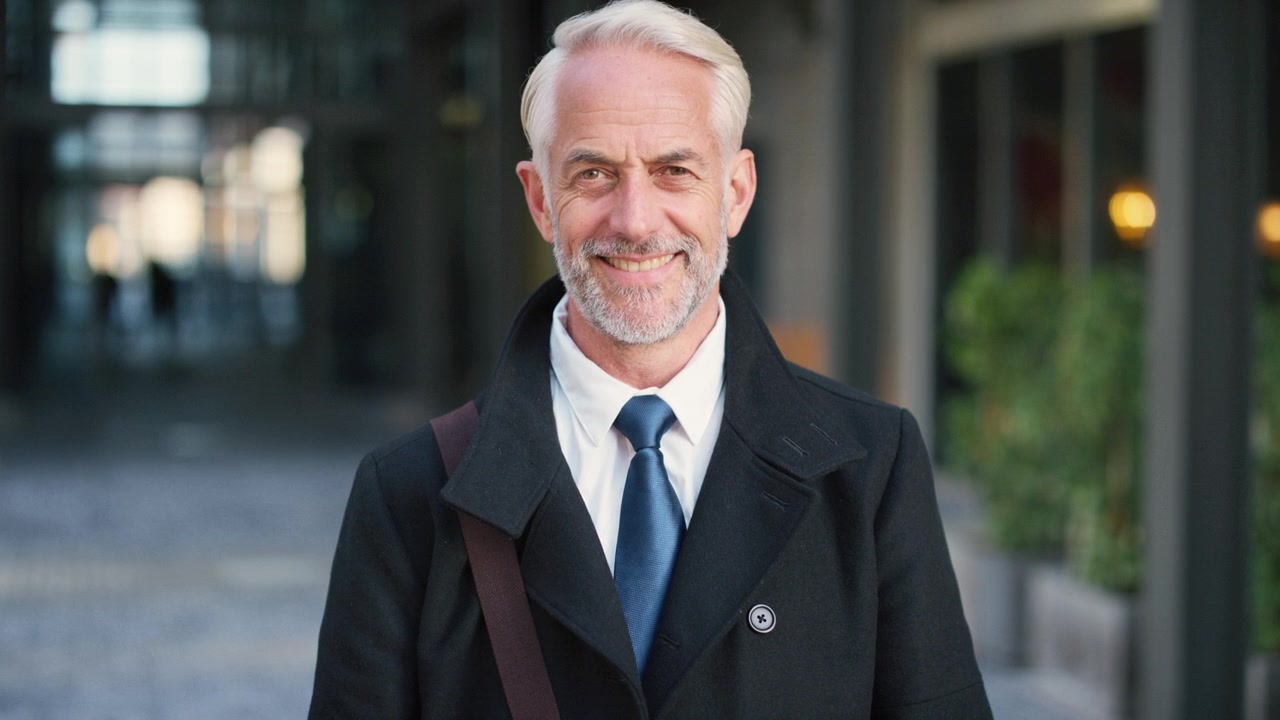 Portrait of a Confident Mature Businessman Smiling Outdoors