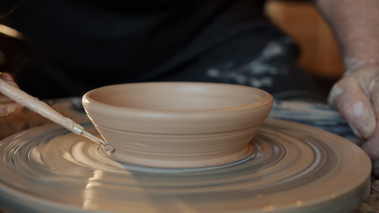 Creating a bowl on a pottery wheel