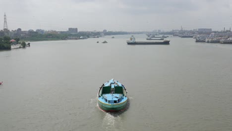 river scene with ships and boats in bangladesh