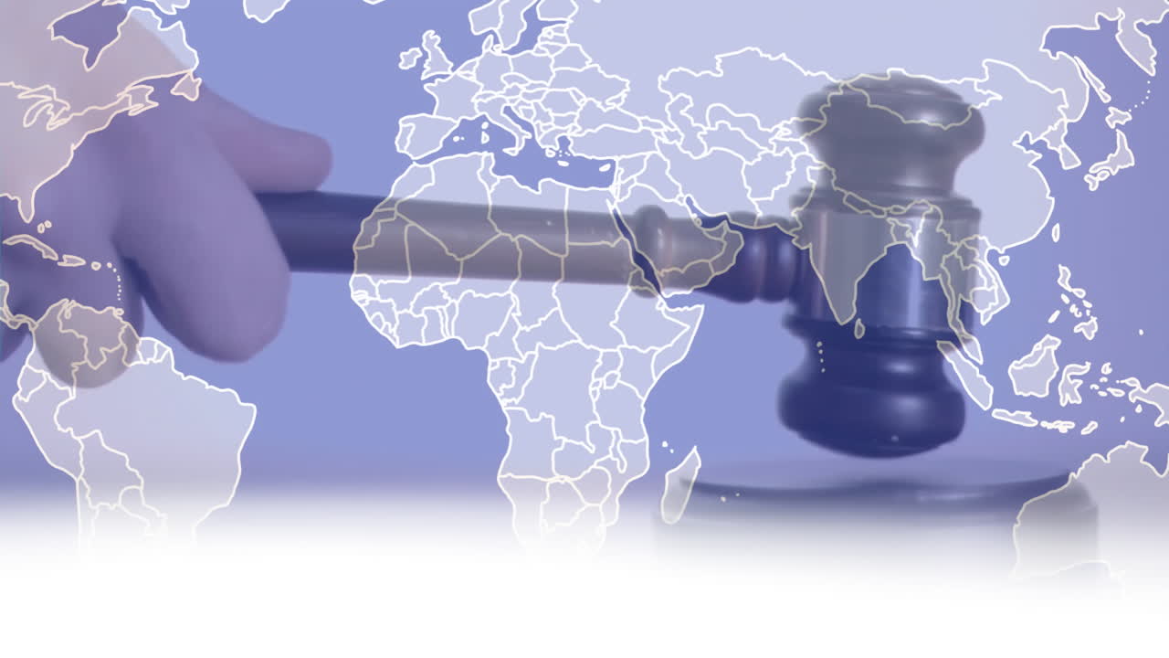 Animation of world map over hand using gavel