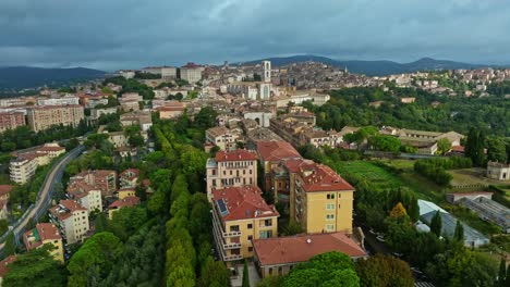 Aerial-of-the-town-of-Borgo-XX-Giugno-and-the-Convent-of-San-Domenico-,-Perugia,-Province-of-Perugia,-Italy