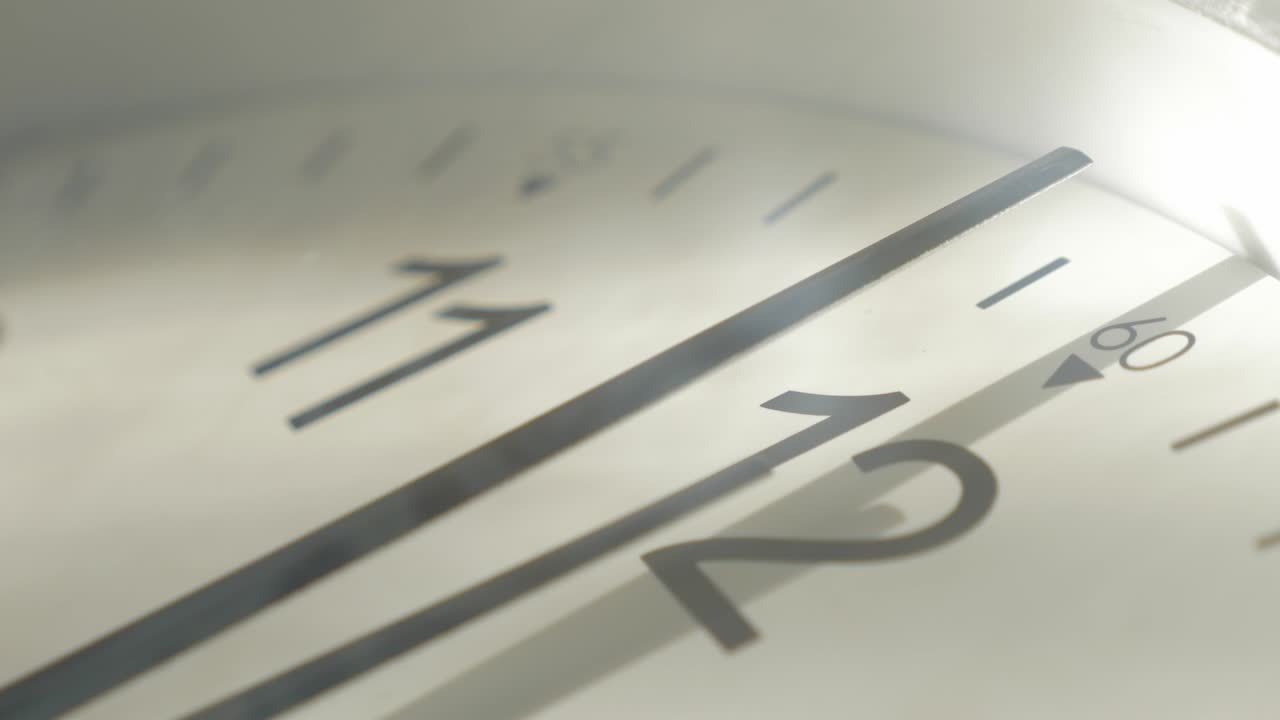 Analog clock needles slow moving to noon time 4K 2160p 30fps UltraHD footage - Classis clock face with 12 hours or midnight  needle showing 4K 3840X2160 UHD video