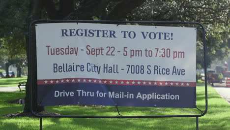 a road side sign encouraging people to register to vote in the 2020 presidential election