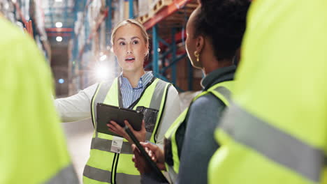 warehouse workers meeting with manager