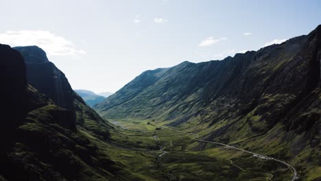 wide drone shot of scotland's famous glencoe valley at midday