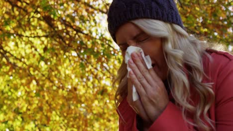 Woman-is-blowing-her-nose