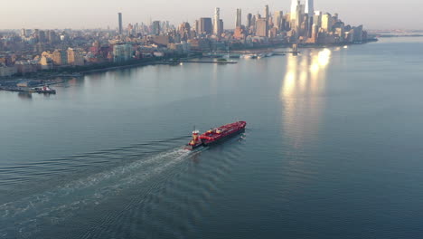 An-aerial-view-of-lower-Manhattan-and-New-Jersey-from-over-the-Hudson-River-at-sunrise