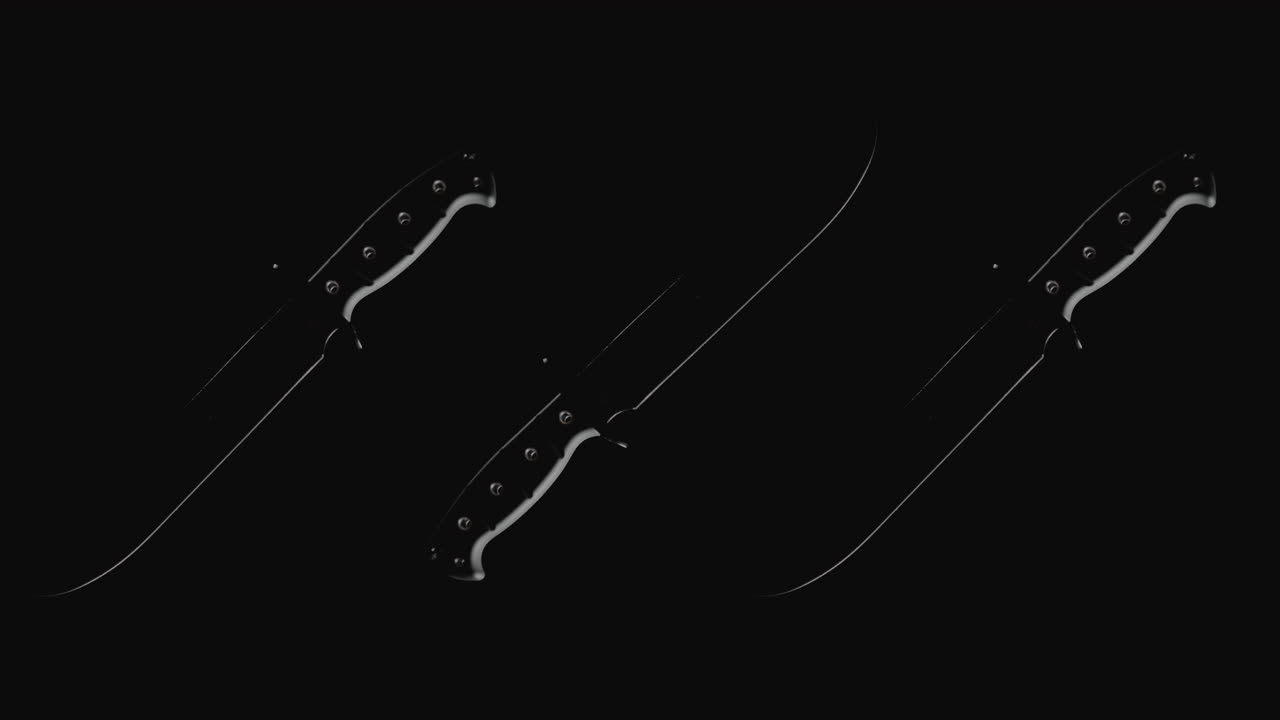 Knives on the dark background rotate in slowmotion