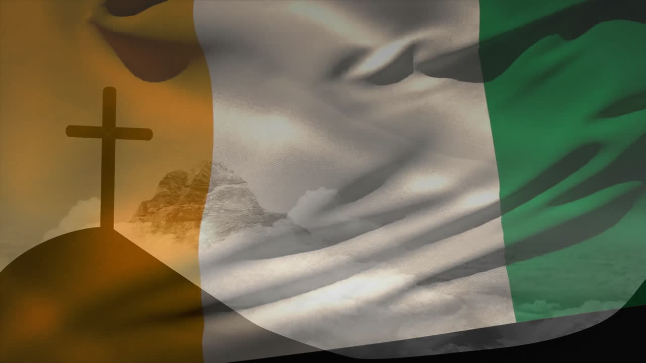 Cross silhouette with mountain and clouds, Irish flag animation in background