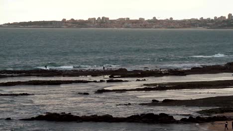 carcavelos beach and view of cascais in portugal