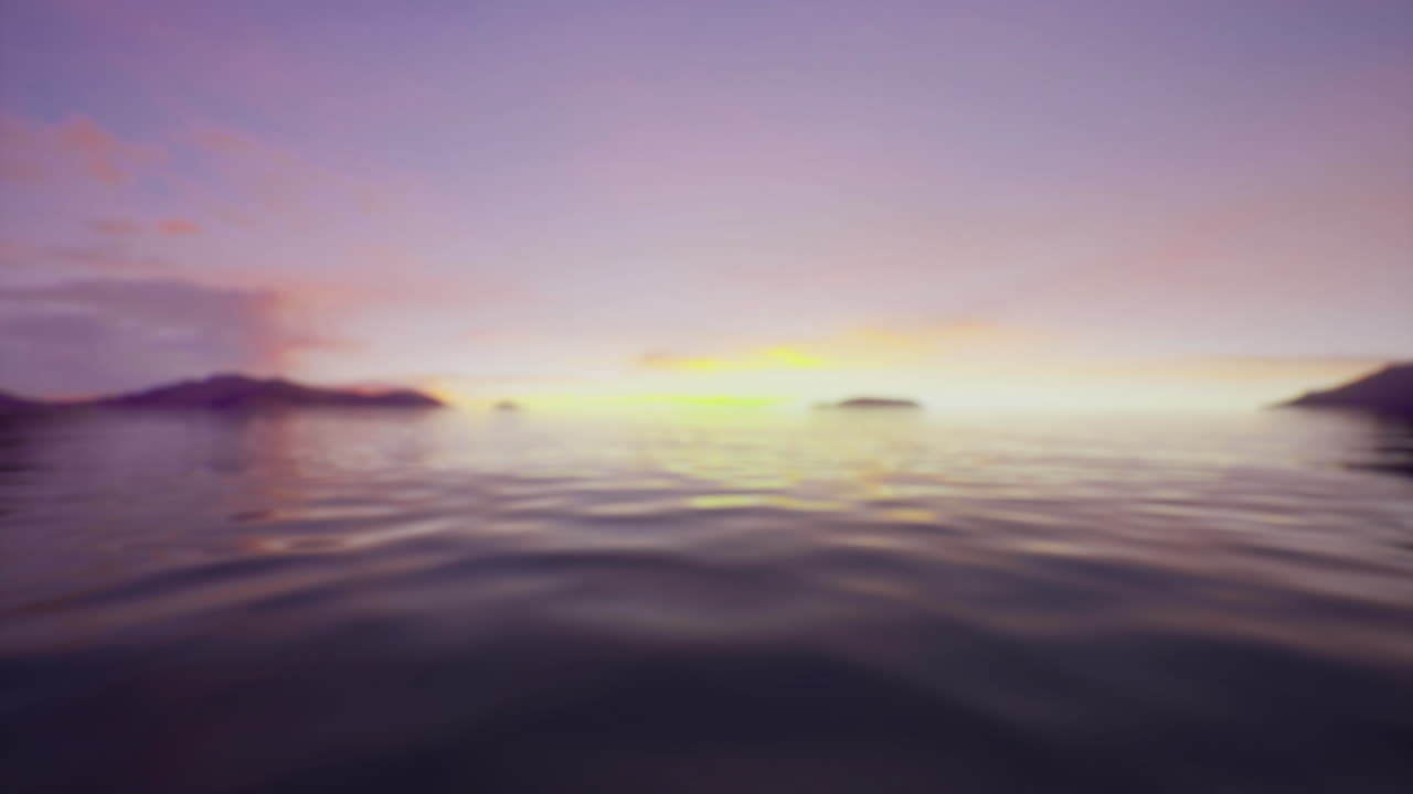 Vibrant sunset over calm waters near distant islands in peaceful landscape