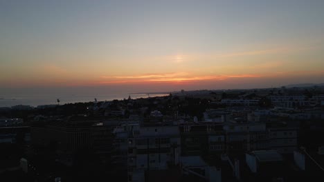 up down aerial view of the beautiful sunset and ocean view, overview cityscape of lisbon