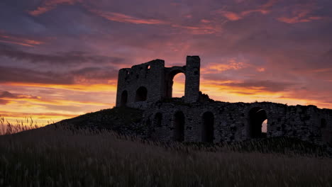 sunset over ancient castle ruins