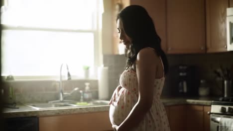 pregnant woman in kitchen