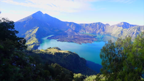 volcanic lake top of mt ranjani lombok indonesia bali timelapse peaceful sunrise cloud passing by mountain scape volcano