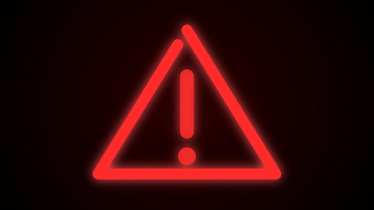 Glowing Red Warning Triangle Symbol Appearing on Dark Background