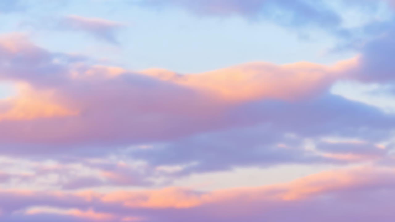 Soft Focus Time Lapse of Colorful Clouds at Sunset