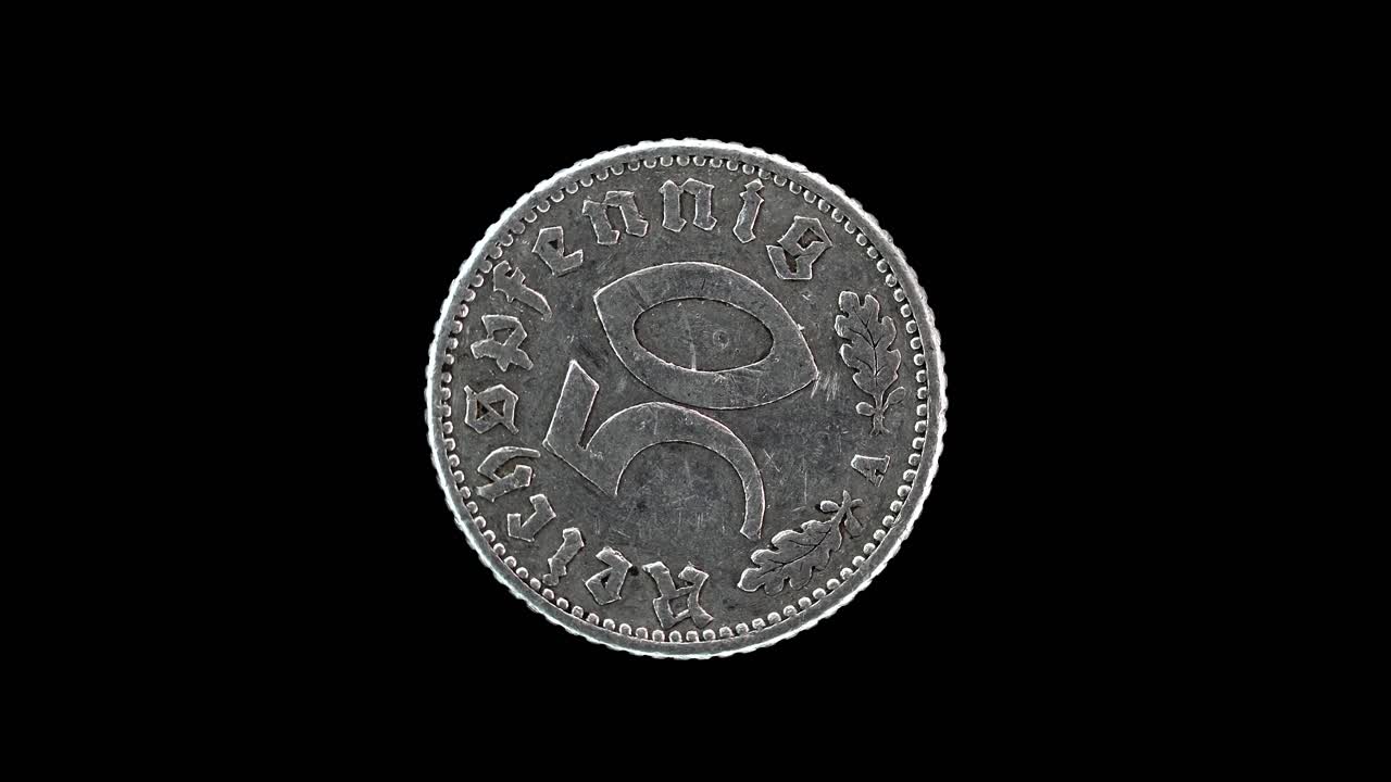 Germany 50 reichspfennig 1940 reverse with denomination and oak leaves macro loop on black background