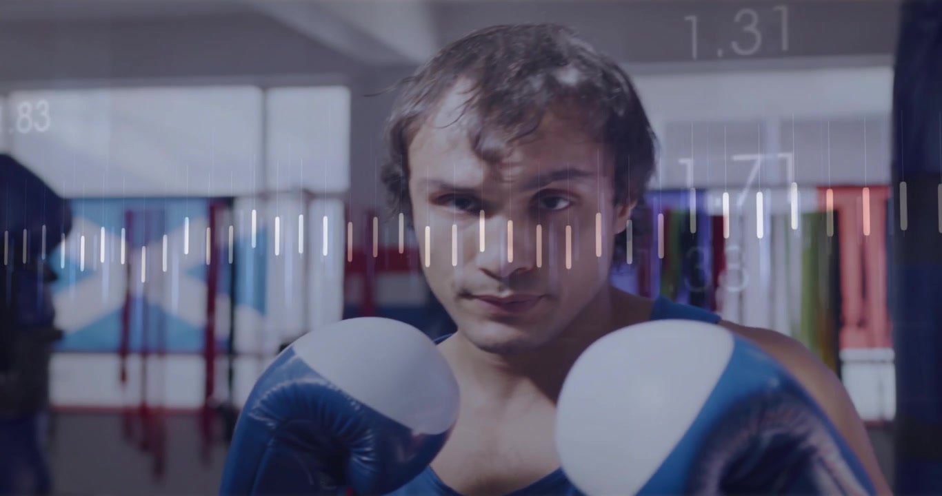 Pugile che sposta il peso, lanciando jab verso la telecamera durante l'allenamento, con una linea arancione in sovrapposizione che sale con le ripetizioni.